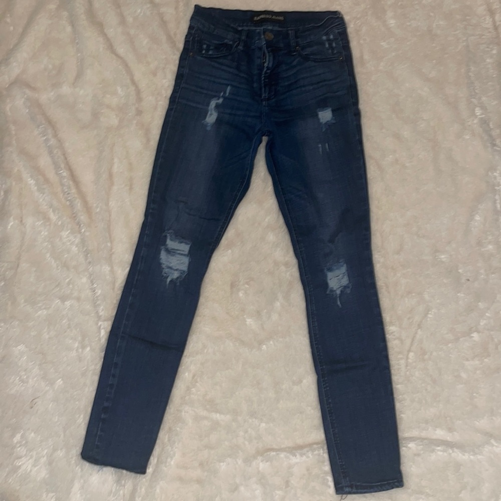 Dark wash distressed denim